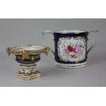 A Grainger & Co Worcester porcelain loving cup, with floral decorated panel and initials 'J D' on