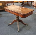 A 19th century brass line inlaid mahogany tea table with D shaped fold over top enclosing baise