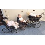 Three various reproduction Victorian style doll's prams, together with three modern dolls; to