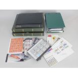 Four albums of British and International stamps, to include Stanley Gibbons Ring 22 Stamp Album