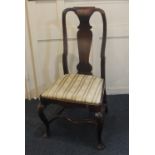A Queen Anne style dining chair with vase splat, drop in seat on cabriole legs with turned and