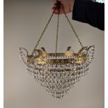 A brass five tier chandelier light fitting with cut glass drops, 31cm diameter