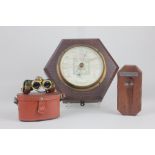 A Captain OM Watts Ltd. S&M Stormoguide wall barometer on hexagonal oak mount 23cm, a wooden ashtray