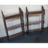 A pair of Chinese Chippendale style hanging wall shelves with top shelf of two small fretwork