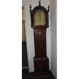 An early 19th century mahogany longcase clock with twelve inch brass dial marked J Higman St Austell