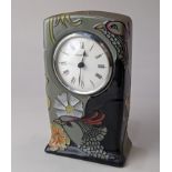 A Moorcroft pottery 'Courting Birds' clock, 16cm high, with box and paperwork