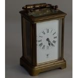 A French brass carriage clock with Roman numerals 15cm