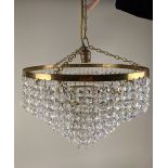 A circular brass five tier chandelier light fitting with hanging glass droplets, 30cm diameter