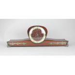 A Rolls Westminster mantle clock with wide rectangular base and brass strap and corner mounts, 66cm