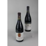 A bottle of Domaine du Grand Tinel 2001 Chateauneuf-du-Pape 750ml 14.5%vol, together with a bottle