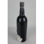 A bottle of vintage port by repute Taylors 1955 missing paper label, with embossed cap provenance: