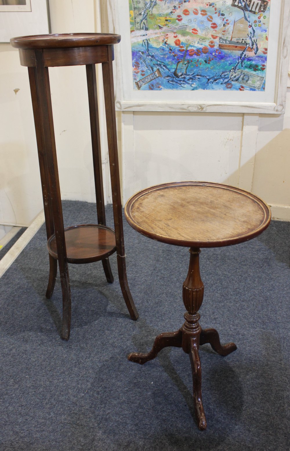 A mahogany circular jardiniere stand with undershelf on four tapered legs, 31cm and a circular