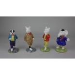 A collection of four Beswick 'Rupert' character figures comprising Rupert Bear, Bill Badger, Podgy