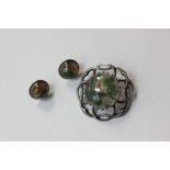 A pair of moss agate ear studs in silver; and a similar brooch