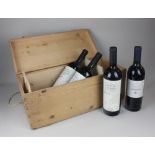 A crate of four bottles of red wine comprising three 75cl bottles of Quattro Vicariati Vendemmia