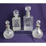 A pair of modern silver mounted cut glass decanters, maker Harrison Brothers & Howson Ltd.,