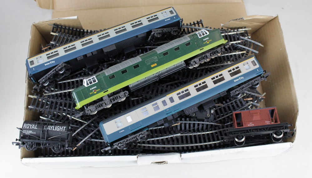 A Lima model railway Meld 9003 locomotive and two Inter-City coaches and various track, together