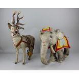 A Merrythought stuffed toy elephant 31cm high, together with a fur covered model of a reindeer