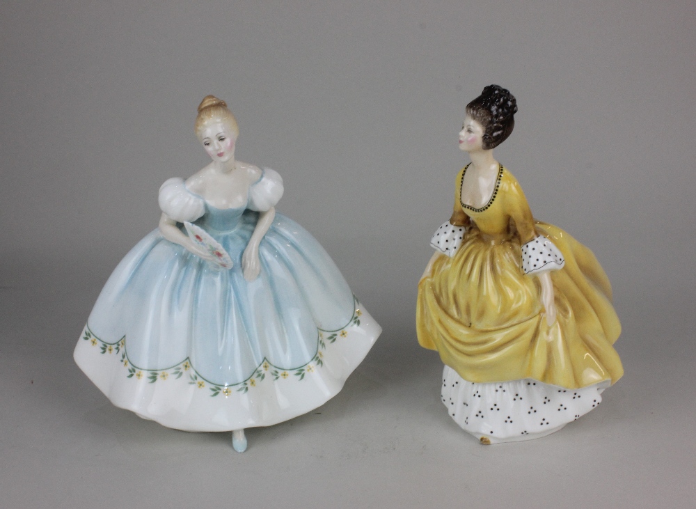 Two Royal Doulton porcelain figures of ladies, 'Coralie', 19cm high, and 'First Dance', 19.5cm high