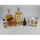 A 50cl bottle of Bell's Finest Old Scotch whisky, and a 50cl bottle of Johnnie Walker Red Label