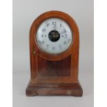 A mahogany cased Bulle Patent electric mantle clock, the silvered dial with Arabic numerals, 35.