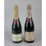 A bottle of Moet & Chandon 1966 Dry Imperial champagne and a bottle of Moet & Chandon Brut