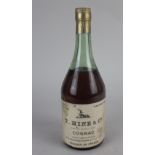 A bottle of T Hine & Co vintage 1951 Grande Champagne cognac shipped in wood and bottled by Messrs