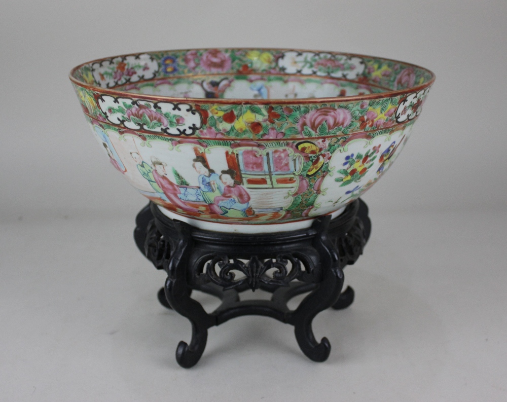 A Chinese Cantonese famille rose porcelain bowl, decorated with panels of figural scenes amongst