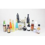 A collection of miniature bottles of spirits, liqueurs and port, to include a Beswick porcelain