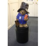 A floor standing donation money box moulded in the form of Paddington Bear, 112cm high