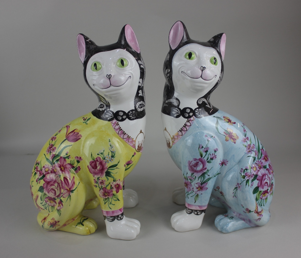 A pair of Mottahedeh authorized reproduction Galle cats, The Royal Pavillion Brighton, with floral