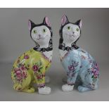 A pair of Mottahedeh authorized reproduction Galle cats, The Royal Pavillion Brighton, with floral