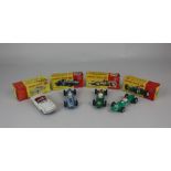 Four Dinky Toys model cars, boxed, comprising a 243 BRM Racing Car, a 240 Cooper Racing Car, a 241
