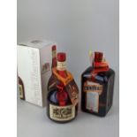 A bottle of Grand Marnier liqueur, boxed, together with a bottle of Cointreau liqueur