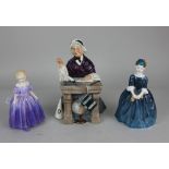 A Royal Doulton porcelain model of a Schoolmarm, 17.5cm high, together with two Royal Doulton