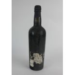 A bottle of Taylors 1940 vintage port, partial paper label provenance: purchased from Christies in