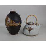 A David Leach pottery teapot, decorated with leaf sprays, together with a St Ives pottery vase