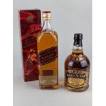 A bottle of Johnnie Walker Red Label Old Scotch whisky, boxed, together with a bottle of Gold