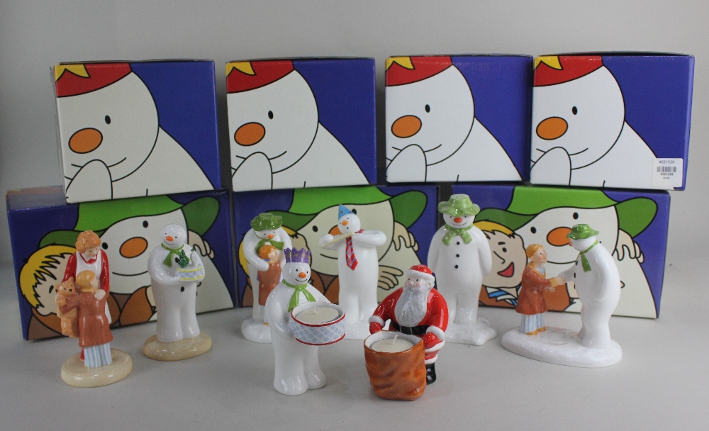 A collection of seven Coalport porcelain 'The Snowman' figures, boxed, to include 'Hug For Mum', '