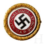 A Golden NSDAP Party BadgeLarge sized gilt bronze issue for the service uniform by maker “DESCHLER &