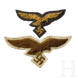 A pair of Luftwaffe General EaglesBreast eagle on white cloth, cap eagle on blue-grey cloth, both