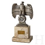 A National Desk EagleSilvered metal, Wehrmacht-style national eagle resting on a three-tiered silver