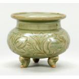 Incense burner, China, probably Ming period. Bulbous shape on 3 feet (toes unglazed),