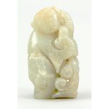 Small jade carving, China, probably 19th century, child with a small animal in his arms.