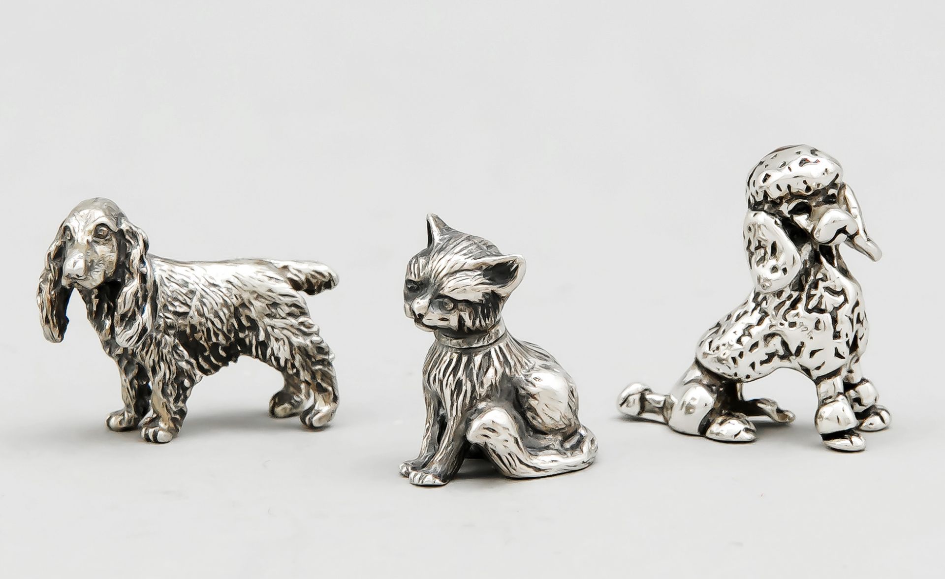 Drei Miniaturen, 2. H. 20. Jh., Silber 835/000 bzw. Sterlingsilber 925/000, 2 Hunde und 1 Kat