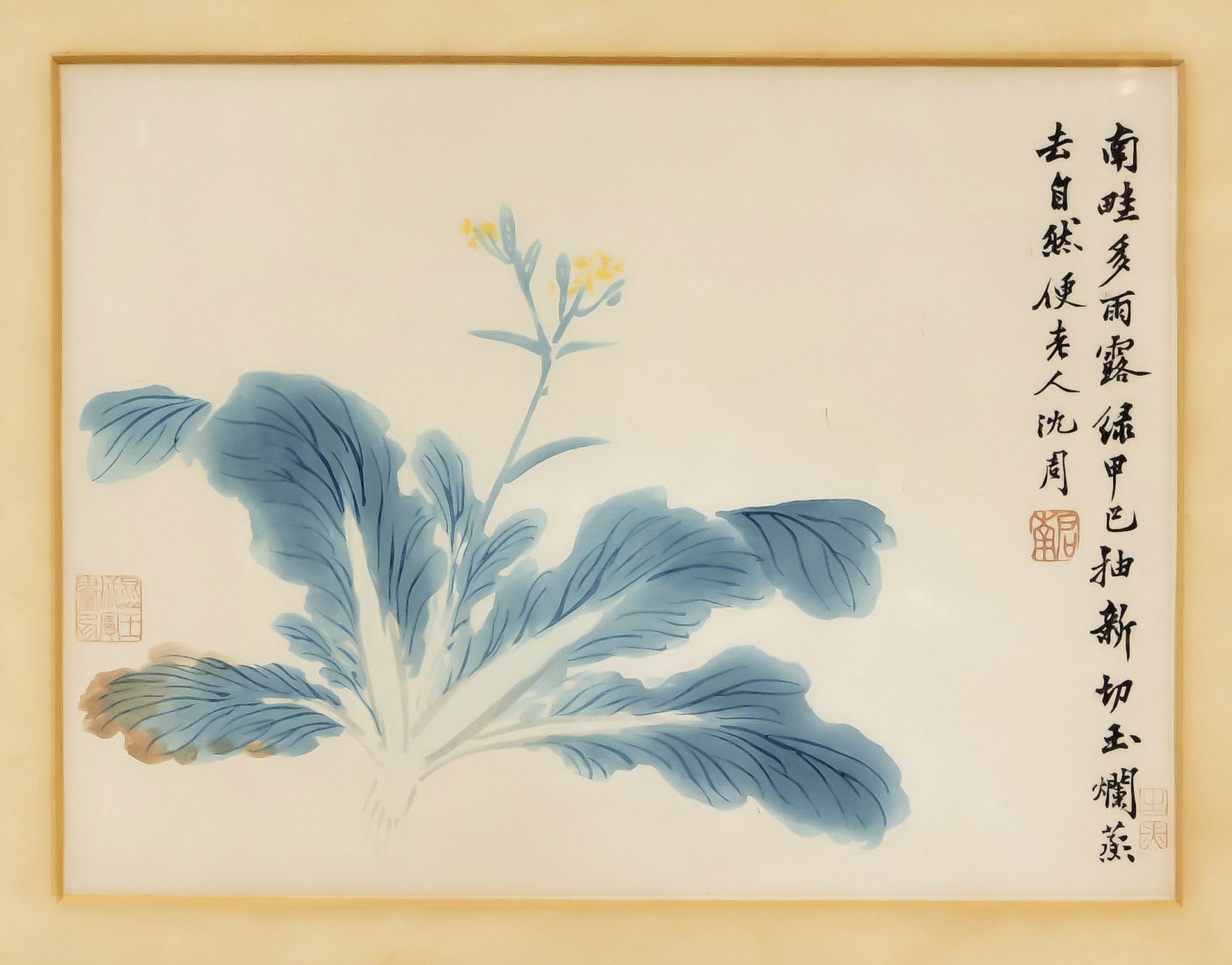 Pair of prints, China, mid-20th c. Depictions of individual plants, calligraphy. Framed behind glass