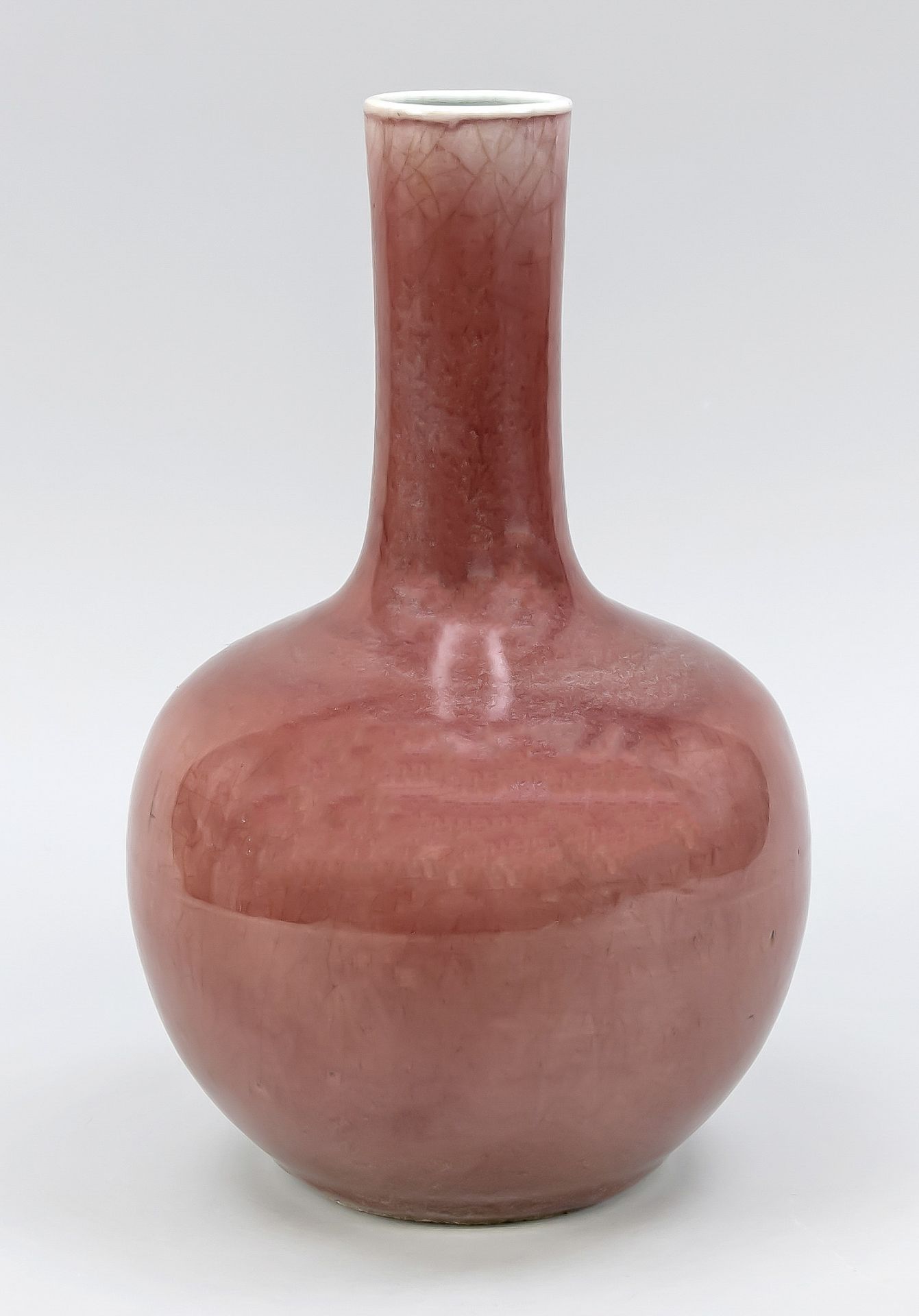 Monochrome vase with Peach Bloom glaze, China, 19th c. (Qing) or earlier? Bellied form with long,