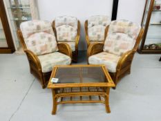 5 PIECE CANE CONSERVATORY SUITE COMPRISING 4 ARMCHAIRS AND A GLASS TOP COFFEE TABLE