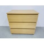 A MODERN LIGHT OAK FINISH THREE DRAWER CHEST - WIDTH 81cm. HEIGHT 78cm.