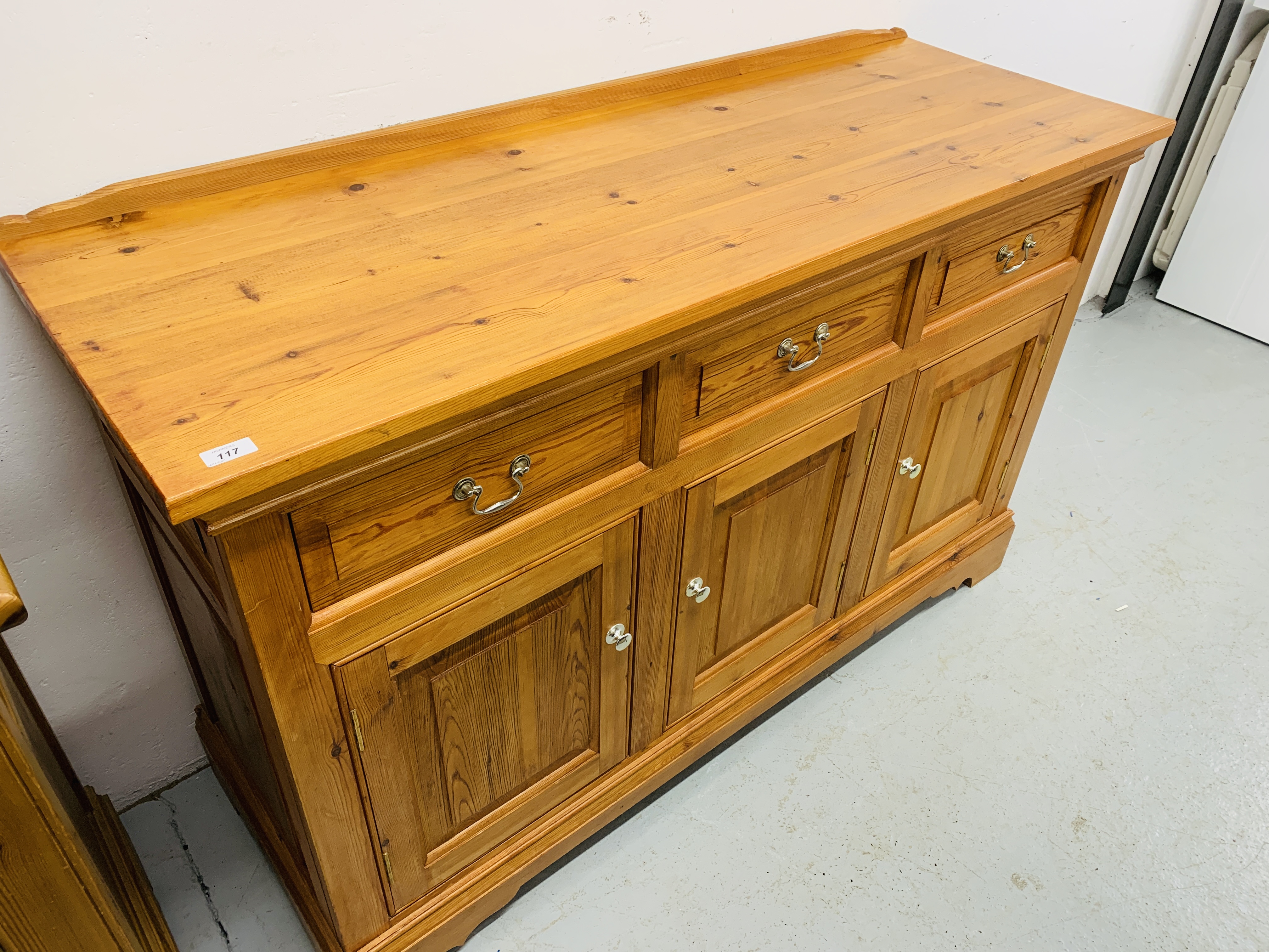 A SOLID PINE THREE DRAWER DRESSER BASE - LENGTH 147cm. HEIGHT 91cm. - Image 5 of 10